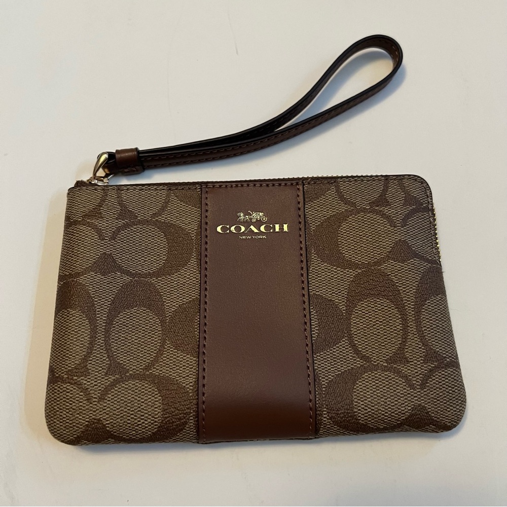 COACH | Corner Zip Wristlet in Signature Canvas With Stripe, Brown.
